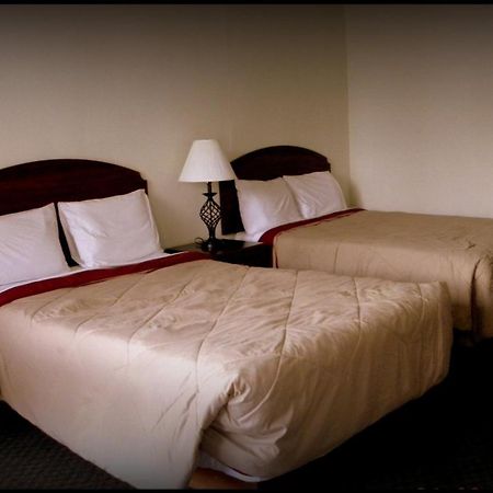 Guest Inn Rogers Rum bild